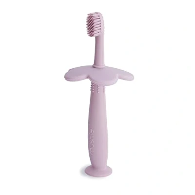Image of Mushie Silicone Training Toothbrush for Infants and Toddlers Suction Base Easy Storage &amp; Material: Food Grade Flower Design (Soft Lilac)