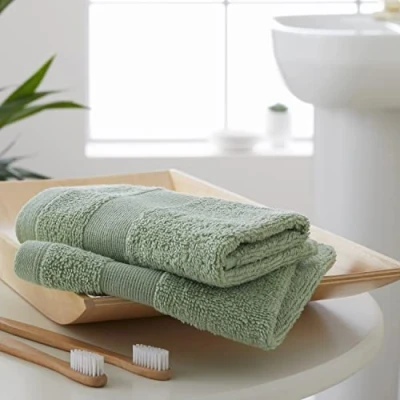 Image of Catherine Lansfield Anti Bacterial Soft &amp; Absorbent Cotton Face Cloth Pair Sage Green