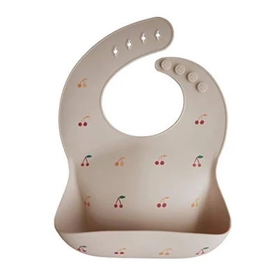 Image of mushie Baby Silicone Bib Adjustable Fit Waterproof Bibs Easy Wipe Feeding 4 Sizes with Deep Front Pockets 100% BPA and Phthalate Free (Cherries)