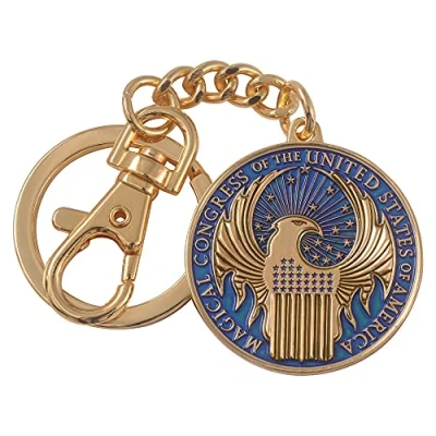 Image of The Noble Collection Fantastic Beasts MACUSA Emblem Keychain 1.5in (3.5cm) Finely Detailed Gold Enamelled Officially Licensed Film Set Movie Props Gifts