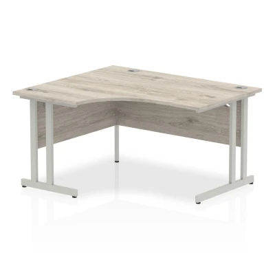 Image of Impulse 1400mm Left Crescent Desk Grey Oak Top Silver Cantilever Leg