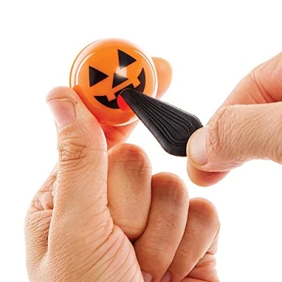 Image of Baker Ross FX421 Pumpkin Tongue Stretchers Pack of 8, Halloween Party Bag Fillers for Kids, Stretchy Gifts, Prizes, and Favours