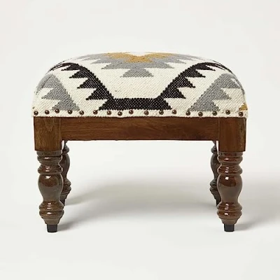 Image of HOMESCAPES Agra Kilim Footstool Traditional Handmade Black &amp; Gold on Wooden Legs Rectangle 50 x 30 40 cm Handwoven Wool Cotton Pouffe with Indian Geometric Design