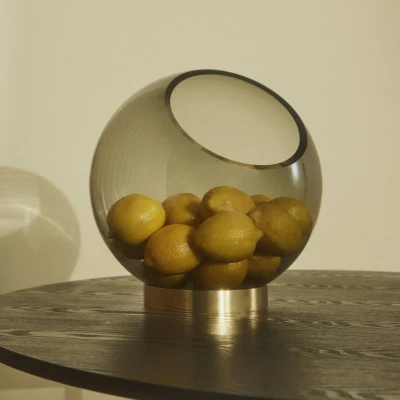 Image of AYTM Globe vase, Ø 17 cm, amber / gold, glass, stainless steel