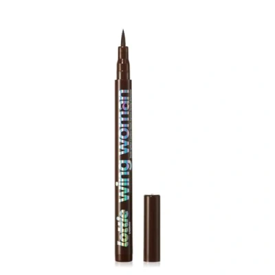 Image of Lottie London Wing Women in Brown, Waterproof Brush Tip Liquid Black Eyeliner for precise application and defined wings
