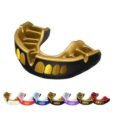 Image of OPRO Gold Level Grillz Mouthguard, Adults and Kids Sports Mouth Guard, with Revolutionary Fitting Technology for UFC, Boxing, MMA, Martial Arts, BJJ All Contact (Black/Gold, Adult)