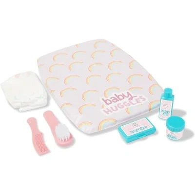 Image of Casdon Baby Huggles Changing Mat Set. Dolls For Children Aged 3+. Includes Reusable Nappy, Brush, Pretend Talc And More, Pink