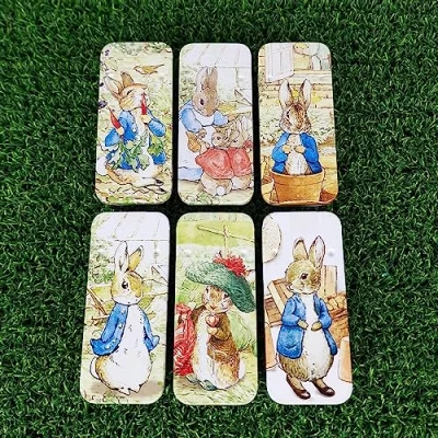 Image of Peter Rabbit Empty Slider Tin 8cm Long Single Cracker Filler Mini Gift