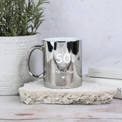 Image of eBuyGB Shiny Silver Mug, 50 &amp; Fabulous Ceramic Coffee Cup, Milestone Birthday, 50th Birthday Gift for Her, Mum, Auntie, Friend