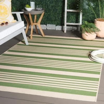 Image of SAFAVIEH Striped Rug for Indoor &amp; Outdoor Courtyard Collection, Short Pile, in Green and Beige color, 160 X 231 cm