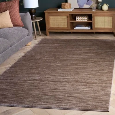 Image of SAFAVIEH Glam Solid Color Rug for Living Room, Dining Bedroom Vision Collection, Short Pile, in Light Brown, 91 X 152 cm