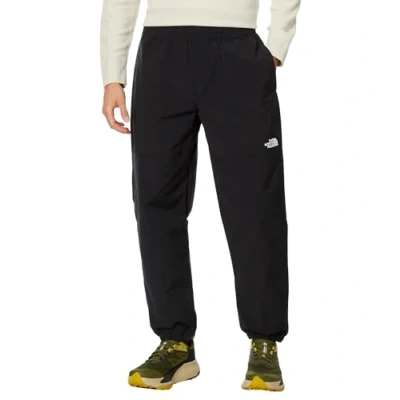 Image of The North Face EASY WIND PANT Tracksuit bottoms, Men&#039;s, Size: Small, Black