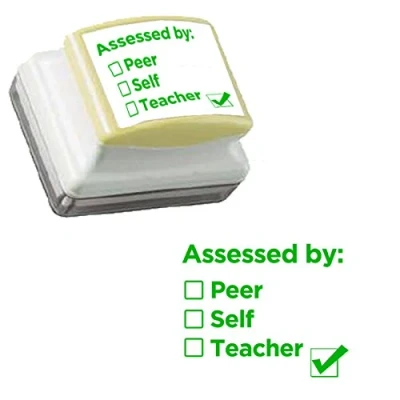Image of Assessed by: Peer / Self Teacher inking School Assessment Stamp. Green Ink.