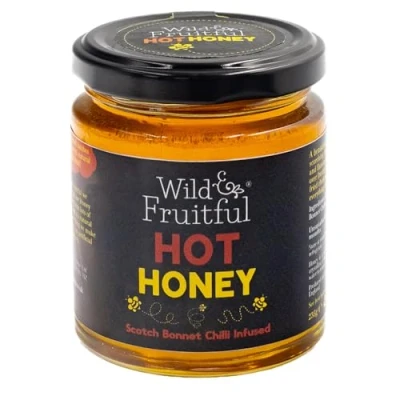 Image of Wild &amp; Fruitful Hot Honey 235g Jar Golden Infused with Scotch Bonnet Chillies Hand Made in Cumbria