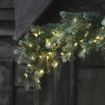 Image of Lights4fun 1.5m Pre Lit Christmas Garland Indoor Decoration 180 Dual Micro LEDs Battery Operated with Timer