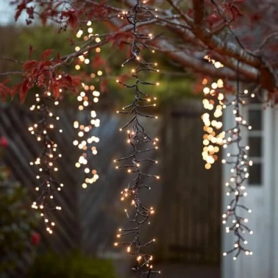 Image of Lights4fun Christmas Cascading Cluster String Fairy Lights 480 Warm White LEDs Plug in Indoor and Outdoor Use