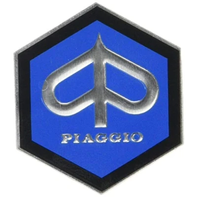 Image of RMS Emblem “Piaggio hexagonal cascade aluminium, self adhesive 49x43 mm for Vespa sprint/rally etc.