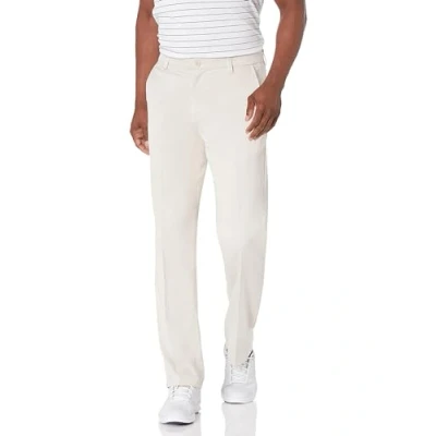 Image of Amazon Essentials Men&#039;s Classic Fit Stretch Golf Trousers (Available in Big &amp; Tall), Stone, 32W / 33L