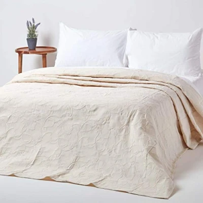 Image of HOMESCAPES White Cotton Rich Metelassé Textured Cream Bedspread with Floral Pattern, Single