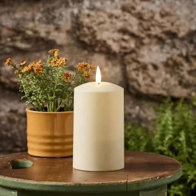 Image of Lights4fun 12.5cm Solar Powered Waterproof TruGlow® LED Flameless Garden Patio Candle Realistic Warm White Flickering Flame