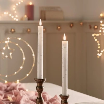 Image of Lights4fun Set of 2 TruGlow® Real Wax Taper Candles with Moon &amp; Star Design Battery LED Flameless Timer and Remote Control Indoor Use