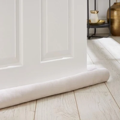 Image of Catherine Lansfield Kingsley Matt Velvet Double Sided Under Door Draught Excluder Cream