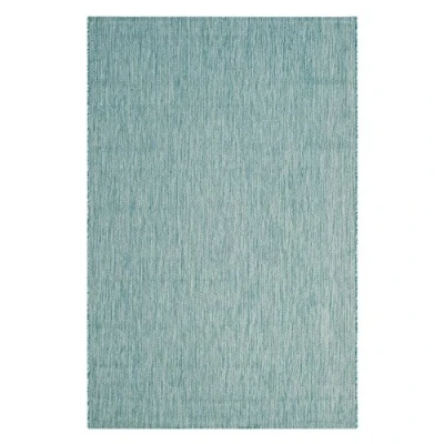 Image of SAFAVIEH Contemporary Rug for Indoor &amp; Outdoor Courtyard Collection, Short Pile, in Dark Aqua and Light color, 79 X 152 cm