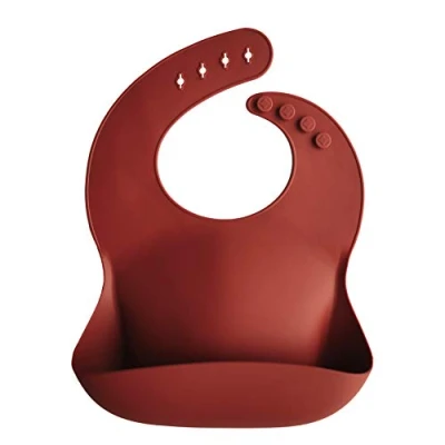 Image of mushie Baby Silicone Bib Adjustable Fit Waterproof Bibs Easy Wipe Feeding 4 Sizes with Deep Front Pockets 100% BPA and Phthalate Free (Raw Sienna)