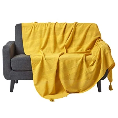 Image of HOMESCAPES Rajput Ribbed Throw 60 x 80 Inches Plain Yellow Handmade 100% Cotton Suitable for most 2 Seater Sofas Single bedspreads Easy care washable at home