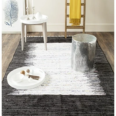 Image of SAFAVIEH Modern Rug for Living Room, Dining Bedroom Montauk Collection, Short Pile, in Ivory and Black, 122 X 183 cm