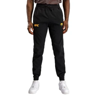 Image of Venum UFC Fusion Pay Fight Week Men&#039;s Trousers Black/Gold