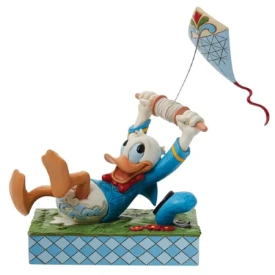 Image of Disney Traditions by Jim Shore A Flying Duck Donald Figurine