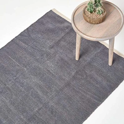 Image of HOMESCAPES Dark Grey Rug 100% Cotton Plain Modern Reversible Chenille Floor Mat with Natural Colour Trim Anti Shedding Soft Touch Washable, Large, 90 x 150 cm (35&quot; 59&quot;)