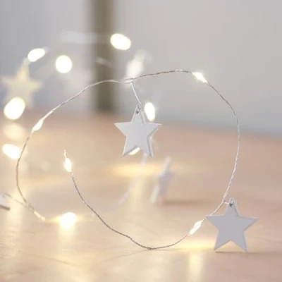 Image of Lights4fun Indoor Christmas 20 Warm White Wooden Star Micro LED String Fairy Lights Battery Operated with Timer 1.9m