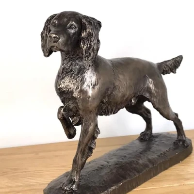 Image of Animal Crackers Springer Spaniel figurine on base cast in heavy weight cold bronze, a fabulous quality sculpture designed by David Geenty, boxed. Length 23cm.