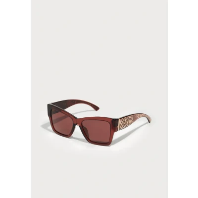 Image of Dolce&amp;Gabbana Sunglasses, Women&#039;s, Size: 55, Transparent bordeaux
