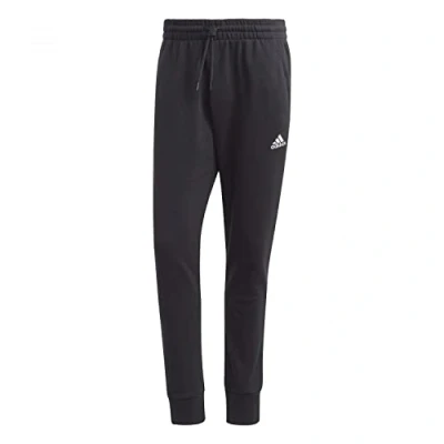 Image of adidas Sportswear Essentials Tracksuit bottoms, Men&#039;s, Size: XS, Black