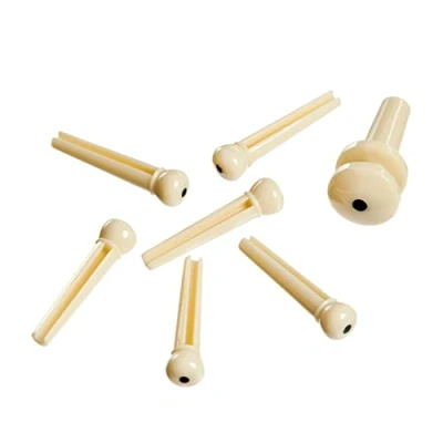 Image of Planet Waves PWPS12 Injected Molded Bridge Pins with End Pin Set of 7 Ivory and Black Dot