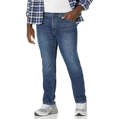 Image of Amazon Essentials Men&#039;s Skinny Fit Stretch Jean, Medium Wash, 36W / 34L