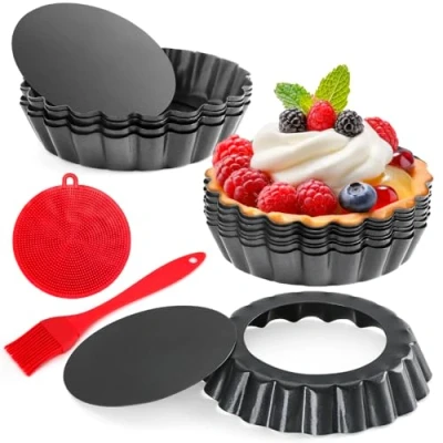 Image of QuyimySet of 12 Non Stick 4 Inch Tart Tins with Removable Bottom Fluted Quiche Dishes Individual Pie Pans Includes Essential Oil Brush and Silicone Scrubber Perfect for Effortless Baking Cleanup