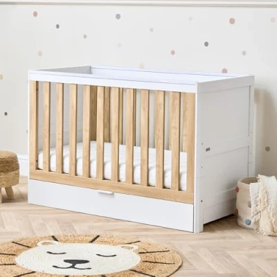 Image of Tutti Bambini Riley Mini Baby Cot Bed with Drawer 3 in 1 Bed, Toddler &amp; Sofa, Convertible for Mattress Heights, from 0 4 Years, White Oak (120 x 60 cm)