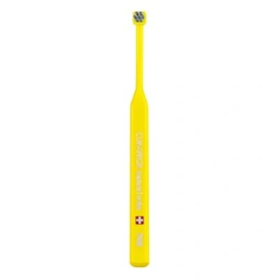 Image of Curaprox Toothbrush CS 708 implant 7 Tufts with fine CUREN bristles Care of Braces, dentures and implants Yellow Blue