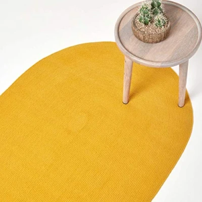 Image of HOMESCAPES Mustard Yellow Handmade Braided Oval Rug For Bedroom &amp; Living Room Reversible Woven Cotton Small Rug, 60 x 90 cm