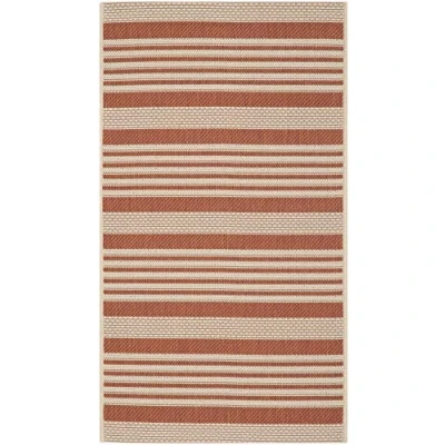 Image of SAFAVIEH Striped Rug for Indoor &amp; Outdoor Courtyard Collection, Short Pile, in Terracotta and Beige color, 79 X 152 cm