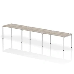 Image of Impulse Bench Single Row 3 Person 1400 White Frame Desk Grey Oak