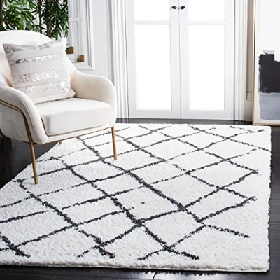 Image of SAFAVIEH Moroccan Shaggy Rug for Living Room, Dining Bedroom Berber Shag Collection, Short Pile, in Creme and Brown, 122 X 183 cm