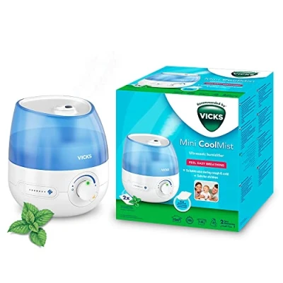 Image of Vicks Mini Cool mist ultrasonic humidifier Adjustable control 1.8 L Tank Home use in bedrooms, offices, nurseries Rooms to 15m2 Quiet operation Essential oil pads included VUL525