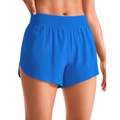 Image of CRZ YOGA Women&#039;s Mid Waisted Running Shorts Side Split Quick Dry Sports Lightweight Gym with Liner Sparkle Blue 10