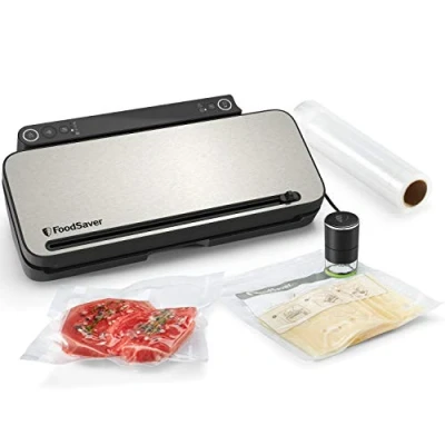 Image of FoodSaver Multi Use Food Preservation System Vacuum Sealer Machine with Handheld Sealer, 1 Roll, 4 Bags &amp; Zipper Silver Black Accents [VS3190]
