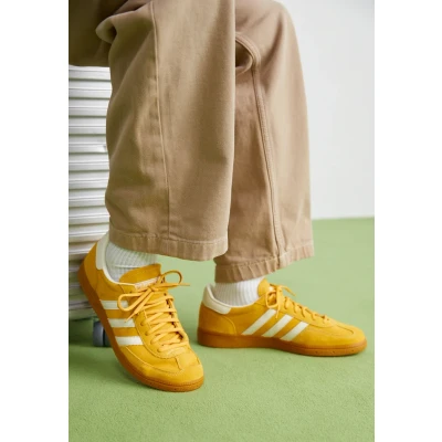 Image of adidas Originals Handball Spezial Unisex Trainers, Size: 11, Preloved yellow/cream white/footwear white Suede